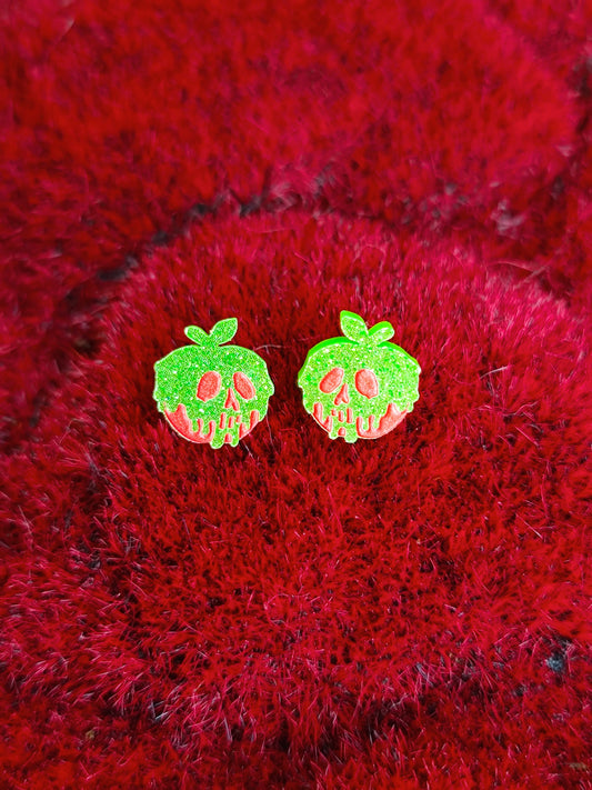 Earrings against a red background