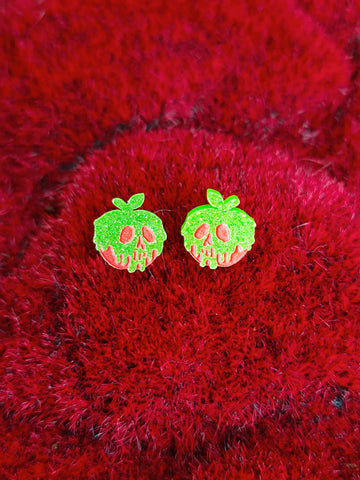 Earrings against a red background