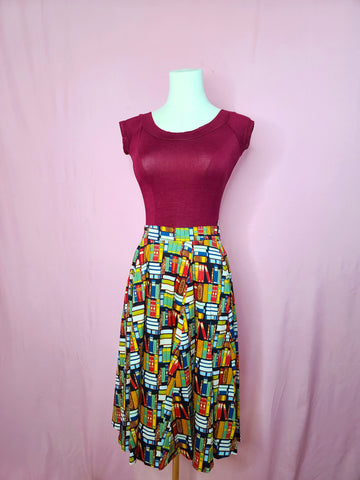 Skirt shown with Retro Boatneck Top in Burgundy on a mannequin against a pink background
