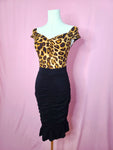 Skirt shown with Isabel Top in Leopard on a mannequin against a pink background