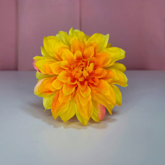 Hair flower against a white and pink background