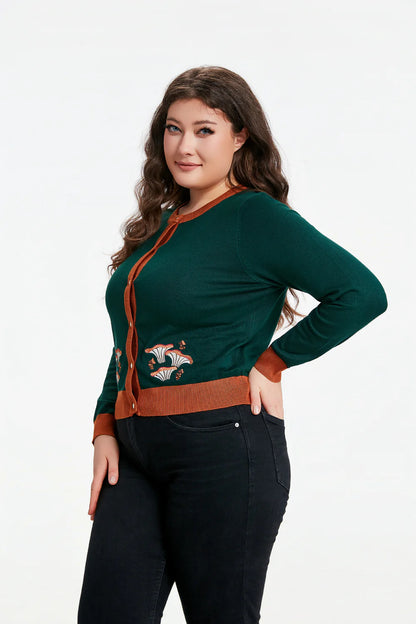Female model wearing the Leslie Mushroom Cardigan against a white background.