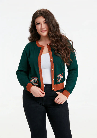 Female model wearing the Leslie Mushroom Cardigan against a white background.
