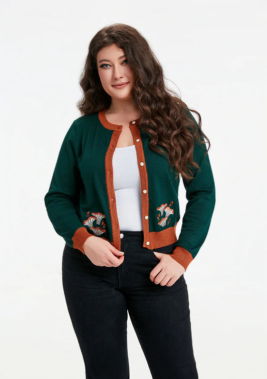 Female model wearing the Leslie Mushroom Cardigan against a white background.