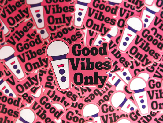 Die cut sticker that says 'Good vibes only' in black text with a pink background surrounded by the same sticker as a background.