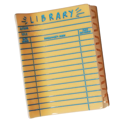 Yellow library card hair claw against a white background.