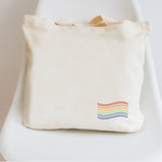 Tote leaning against white background