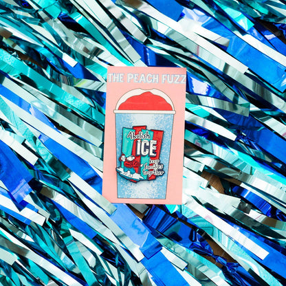 Abolish ICE pin on a colorful background.