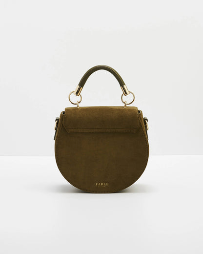 Back of saddle bag with short handle against a white background.