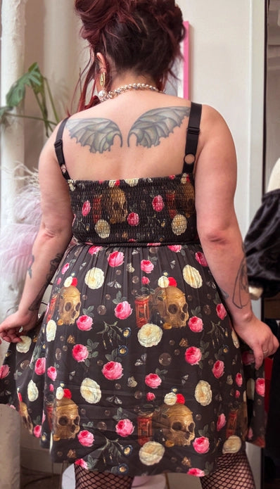 Johanna showing the back of the dress against a light background.