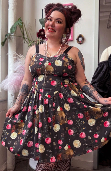 Johanna showing front of dress against a light background.