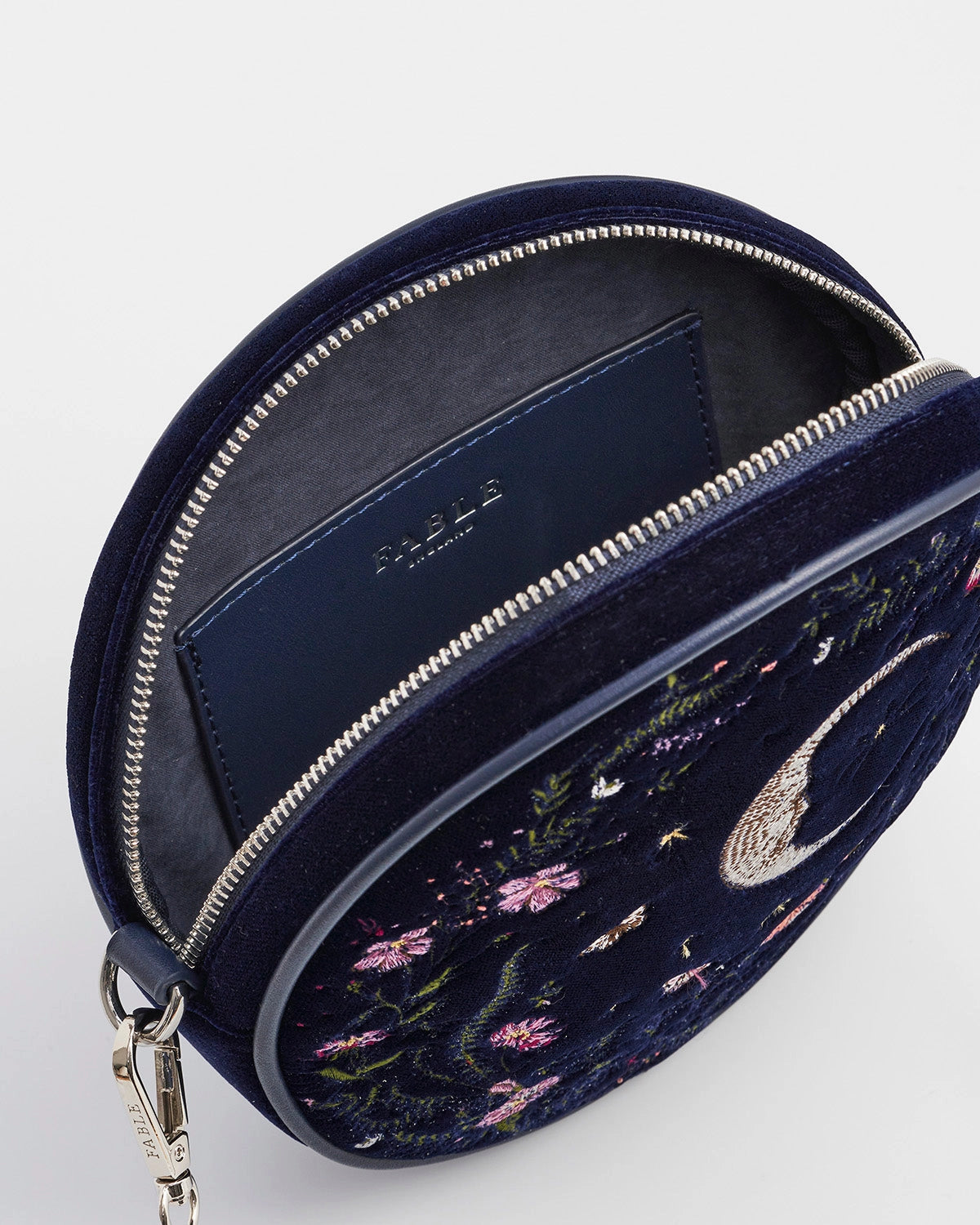 Light blue inside of purse against a white background.