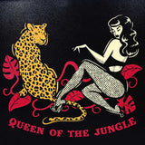 Close up of artwork on the front of the purse. A leopard on the left, and a Bettie Page-esque looking pinup on the right. With the words "Queen of the Jungle" in bold red lettering