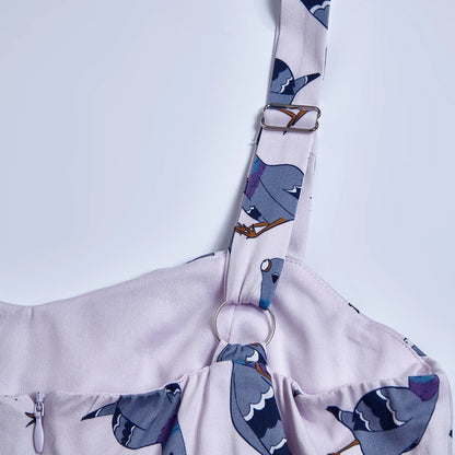 Close-up of adjustable strap against a white background.