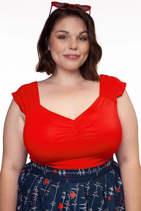 Front of top shown on a white plus sized model against a white background