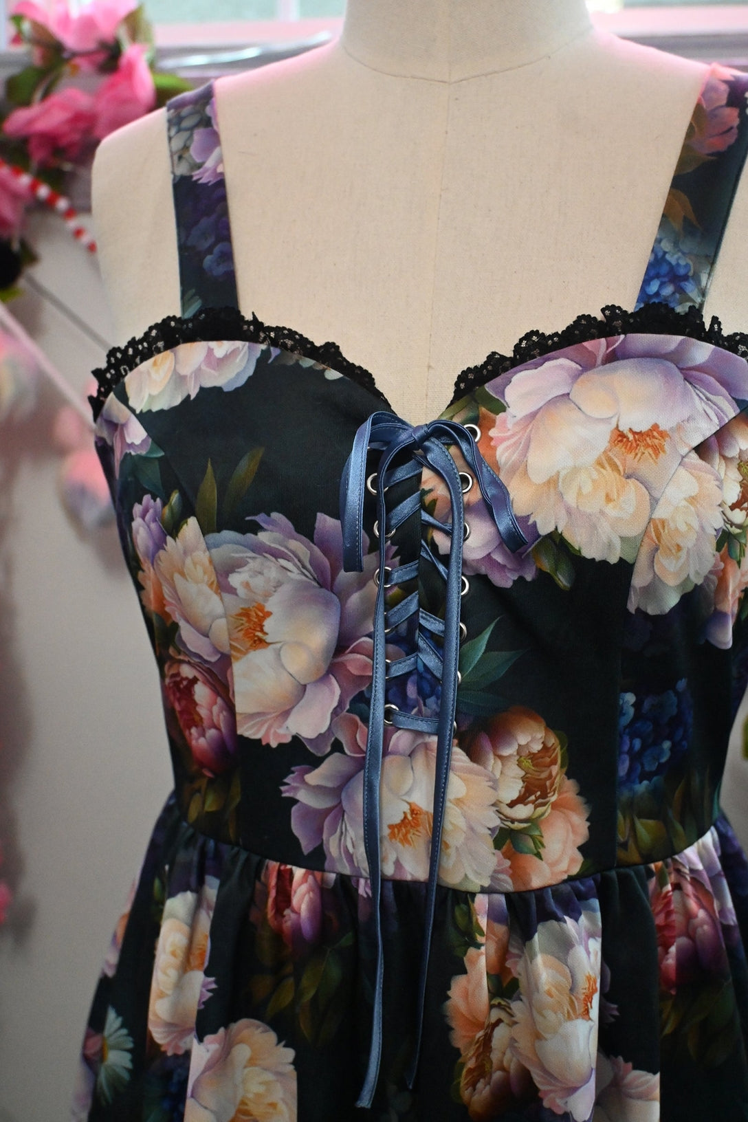 Close up of the front of the dress showcasing the fabric tie front