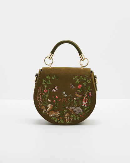 Front of saddle bag shown with short handle against a white background.