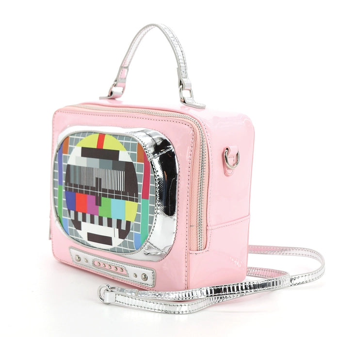 Front of the purse, which features a vintage tv test card on the front screen, against a white background at a slight angle