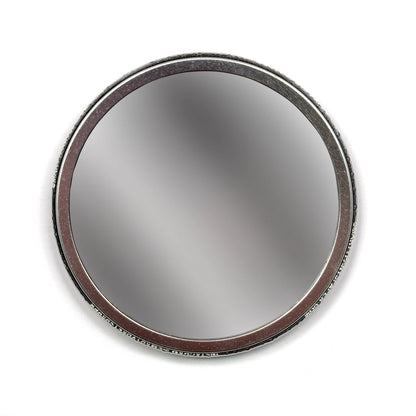 Circle mirror against a white background.