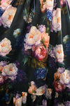 Close up of the details of the fabric florals which are light pink and white peonies