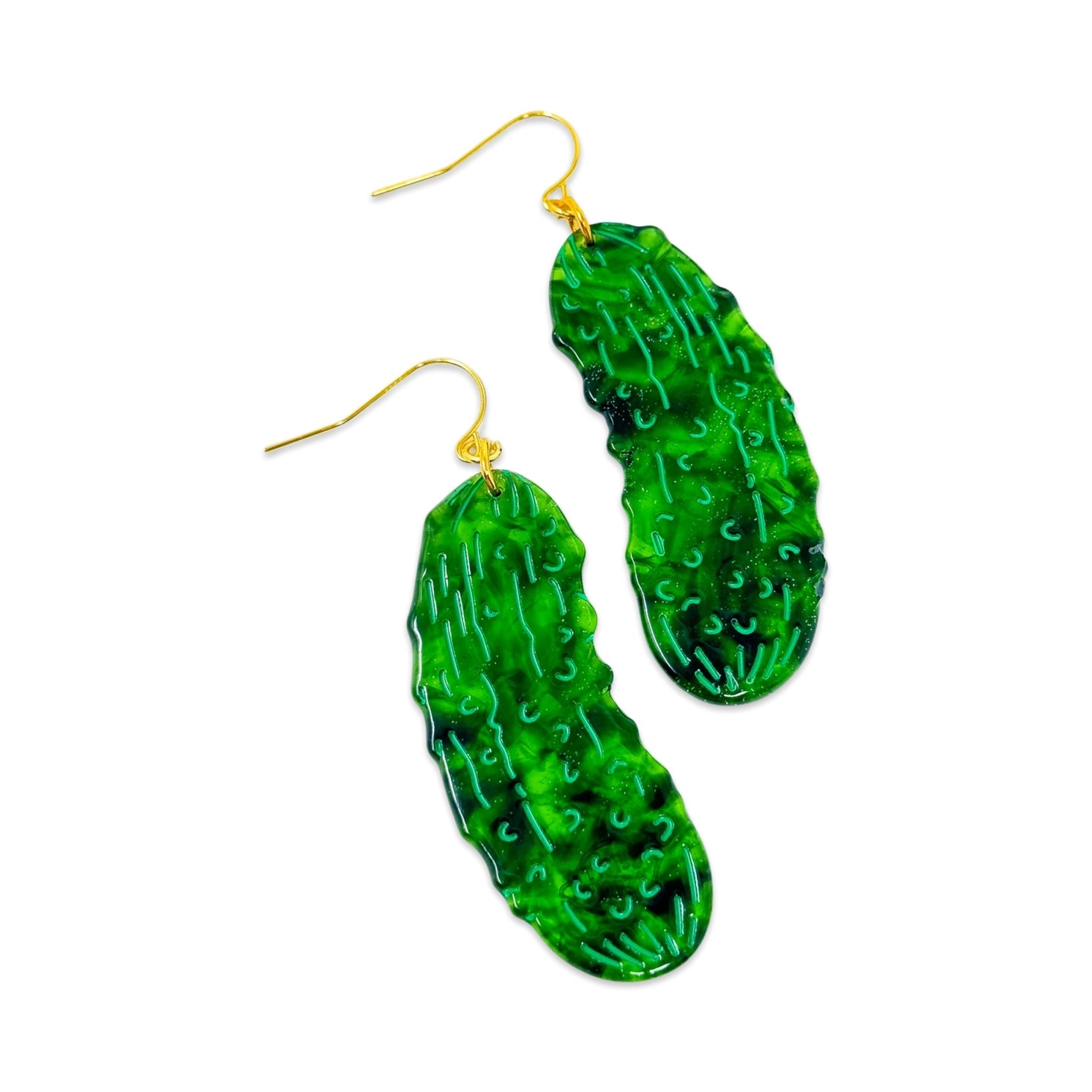 Green pickle earrings on a white background.