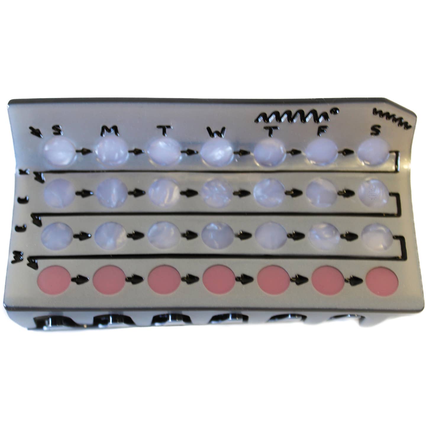 Full view of the birth control hair claw. Designed adter a classic birth control blister pack with white pills in 3 roows, and pink pills in a singular line for the placebo pills found in real birth control packs!