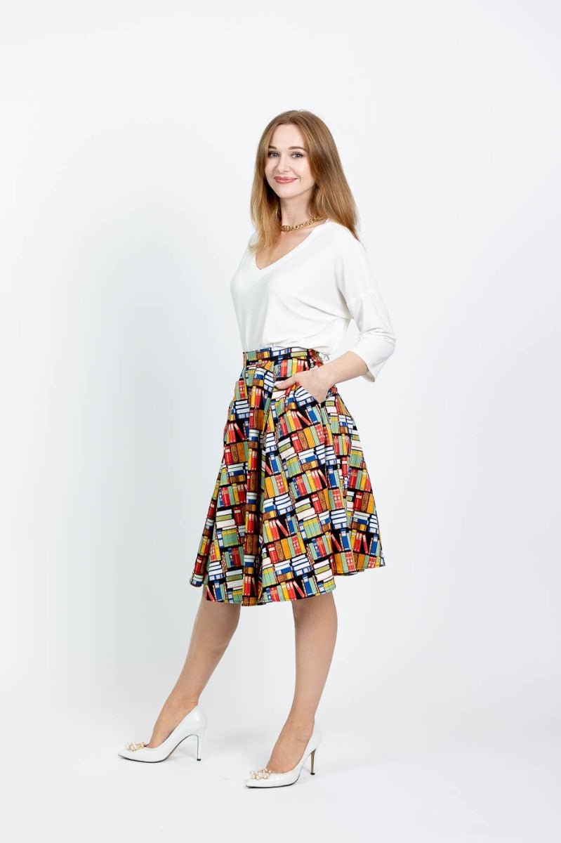 Model at an angle showcasing the side of the skirt against a white background