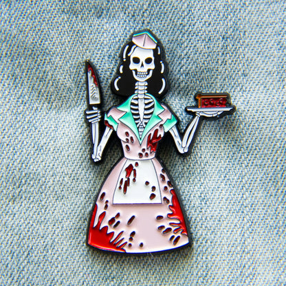 Front of pin on a light blue denim background