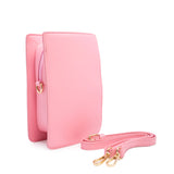 Photo shows the purse from an angle. Purse is a light pink with game-boy like features. Photo shows the purse from the back which is a solid pink