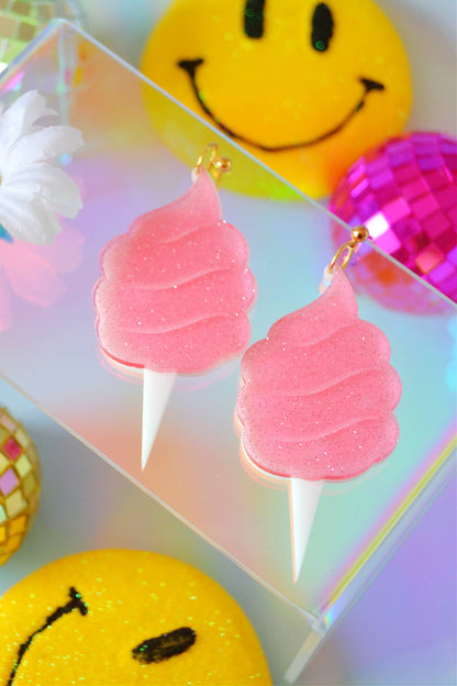 Earrings against colorful background