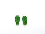 Coffin shaped stud earrings with green glitter color