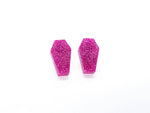 Coffin shaped stud earrings in pink holographic glitter