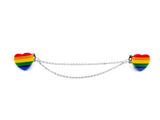 Hearts with rainbow lines. Rainbow colors include: red, orange, yellow, green, dark blue, light blue. Hearts are attached to 2 silver chains