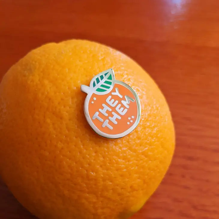 Pin stuck in an orange