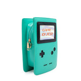Photo shows the purse from an angle. Purse is a light green with game-boy like features. Screen says "Game Over"