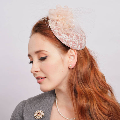 Model with hat on head, light background