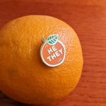 Pin stuck in an orange
