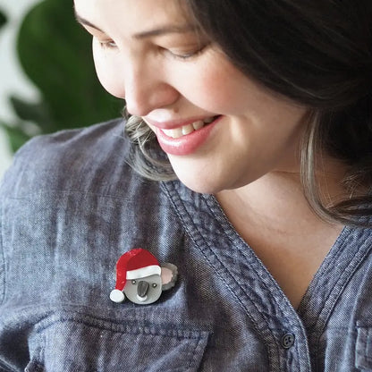 Brooch shown on a denim shirt