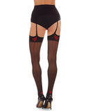 Photo shows a white female presenting model facing away from the camera. Photo only shows the waist down. Stockings are black with a red backseam, and a red heart at the top of the stocking