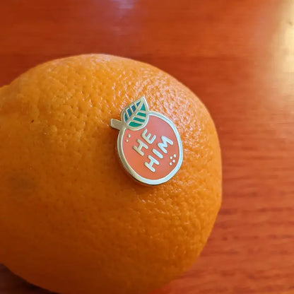 Pin stuck in an orange