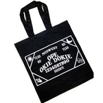 This photo shows the bag against a white background. Bag is black with a white midwest themed ouija board with "ope" "okie dokie" "yeah no" "no yeah" etc on the board