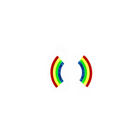This photo shows the earrings upclose on a white background. Earrings are rainbows in the order of red, yellow, green, and sparkly blue