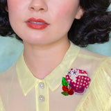 Model wearing brooch on blouse