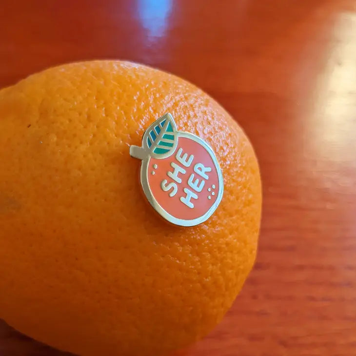 Pin stuck in an orange